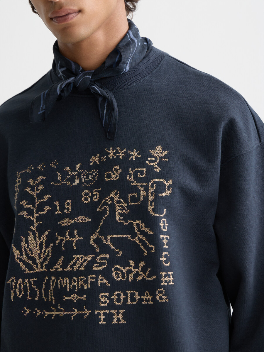 sweatshirt mit kreuzstichmuster und lockerer passform